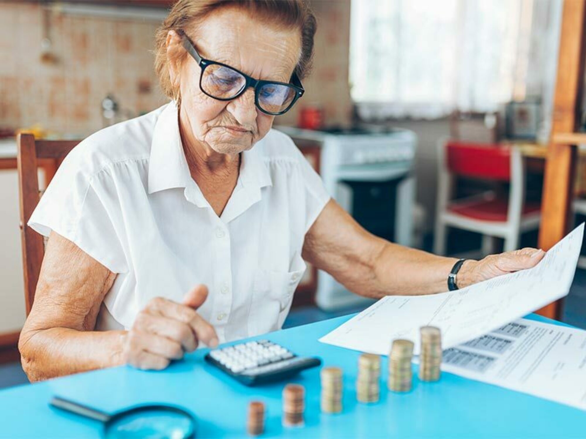 Older woman looking at her finances