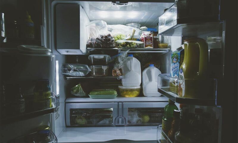 Fridge overfilled with food