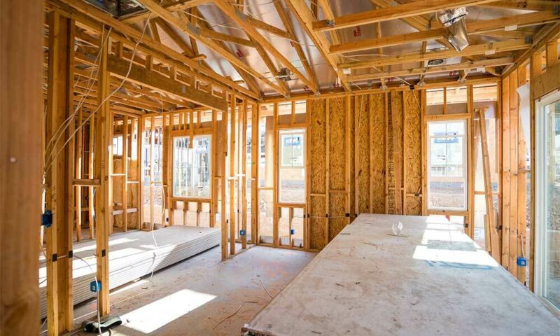 Unfinished home with structure beams up.
