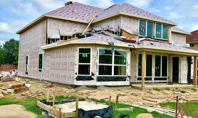 Nearly completed two story home seen from outside.