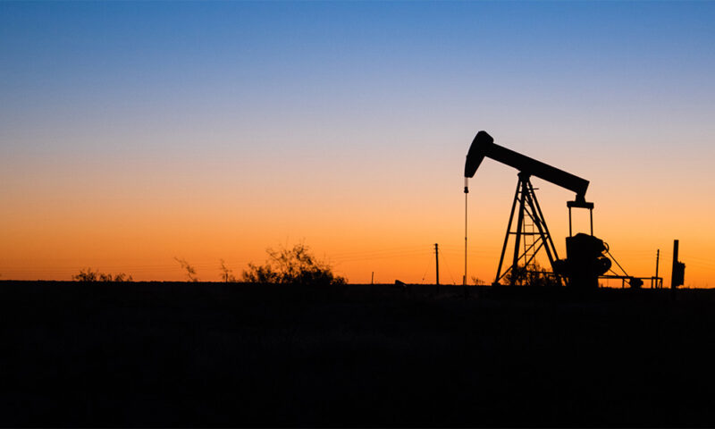 Oil pump in sunset.