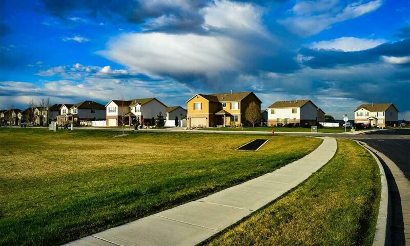 Subdivision with large field and two-story houses.