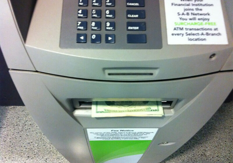 ATM dispensing cash