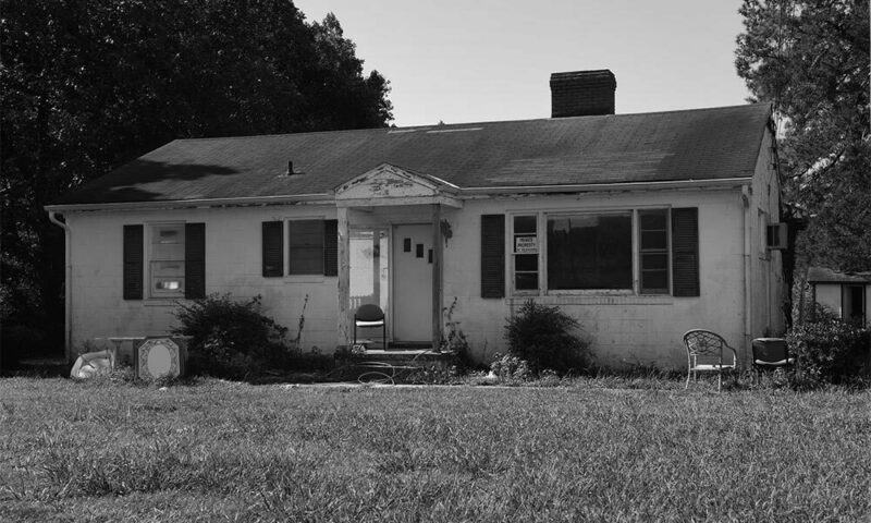 Black and white photo of old house