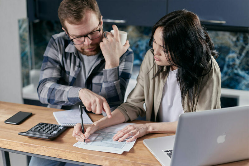 Couple looking over financial documents