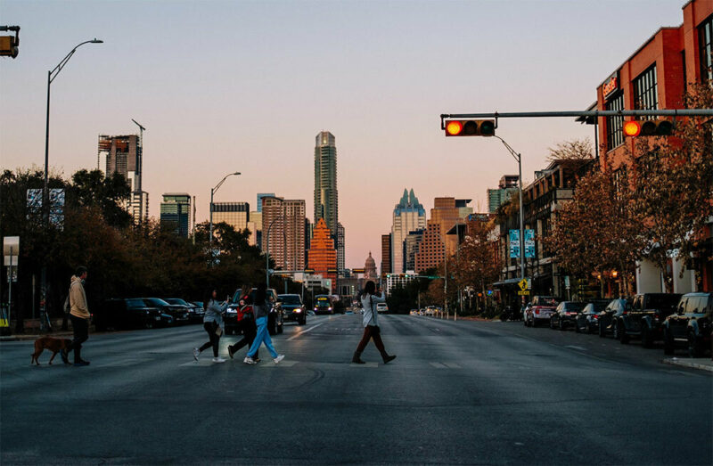 view of downtown Austin and capitol building from crosswalk