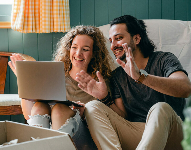 Couple buying a home online