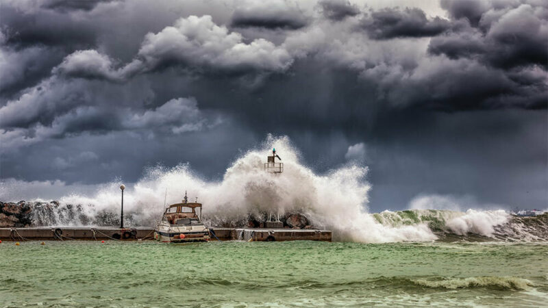 hurricane waves breaking on a dock