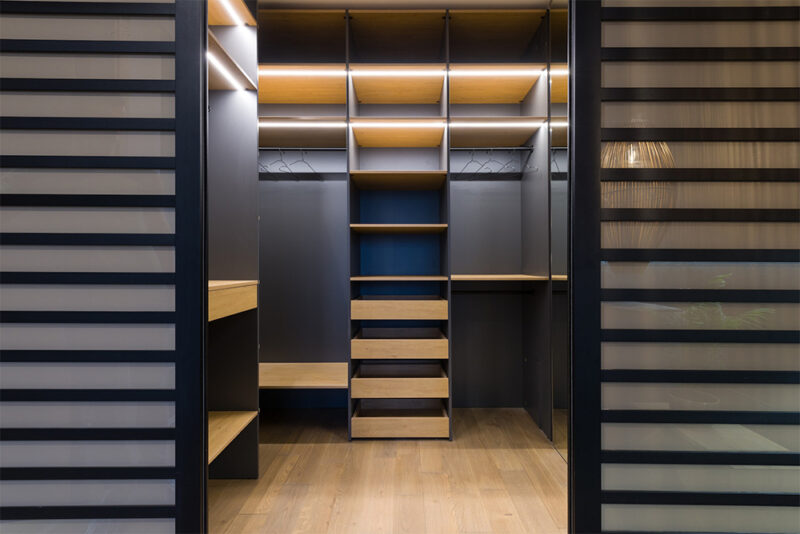 Luxury closet space with many shelves