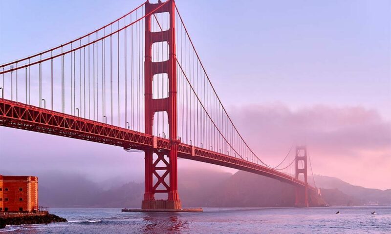 The Golden Gate Bridge during sunrise.