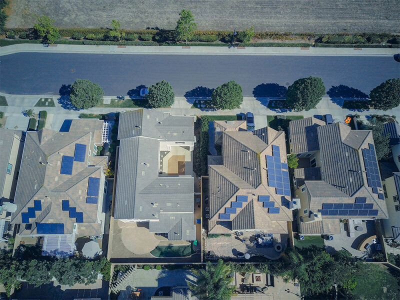 aerial view of solar panels on roofs